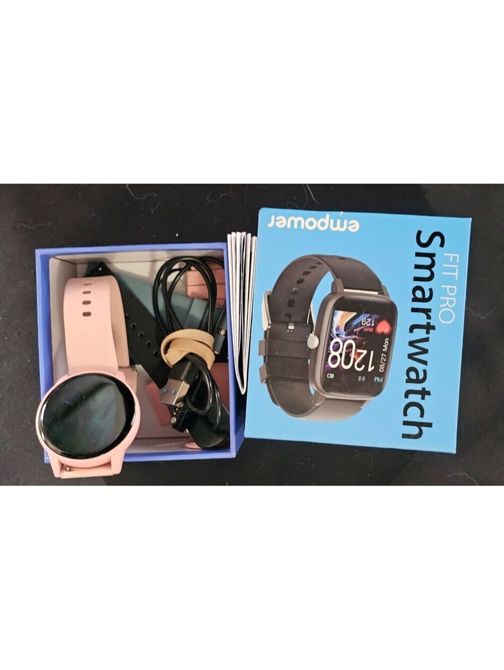 empower Fit Pro Smartwatch with Pink and Black Bands and Charger